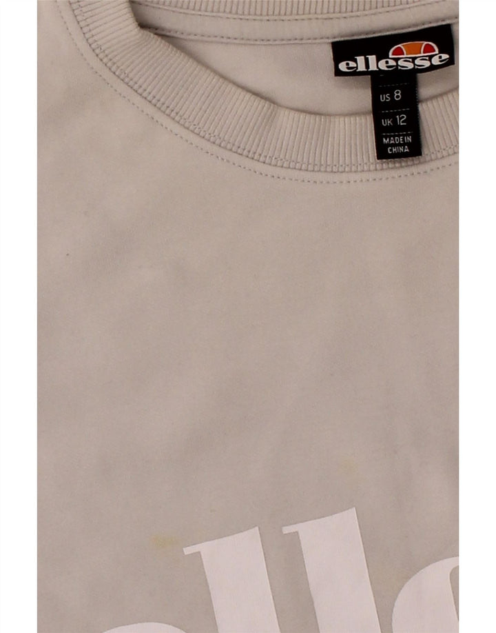 ELLESSE Womens Oversized Graphic Sweatshirt Jumper UK 12 Medium Off White Vintage Ellesse and Second-Hand Ellesse from Messina Hembry 