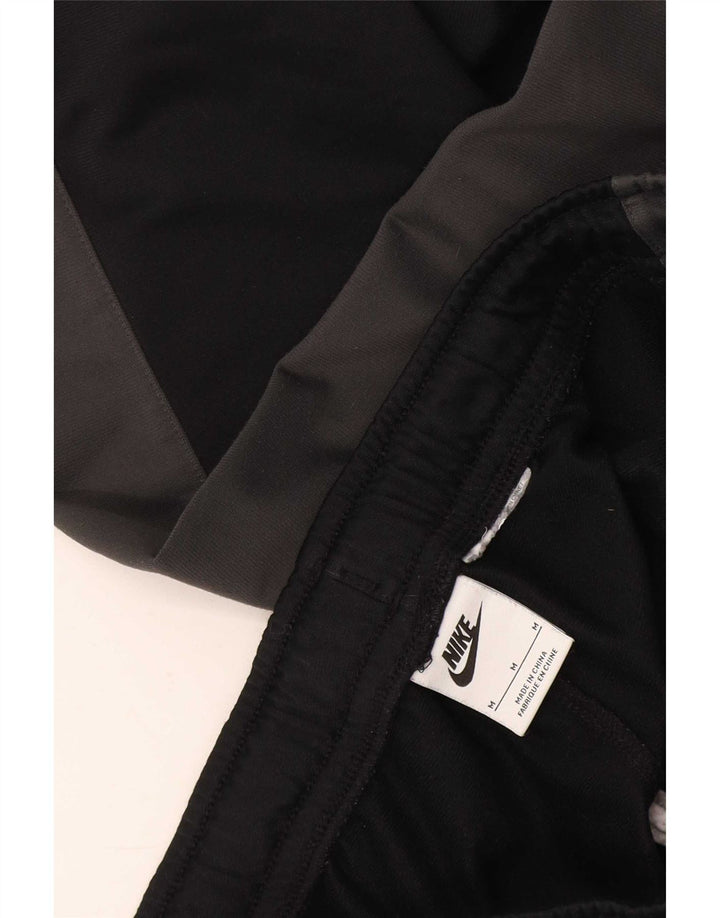 Nike Mens teljes tréningruha közepes fekete színben
