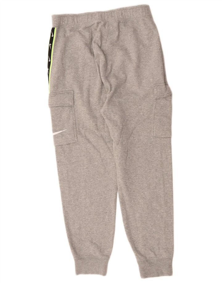Męskie spodnie dresowe NIKE Graphic Cargo, bawełna w kolorze średniej szarości