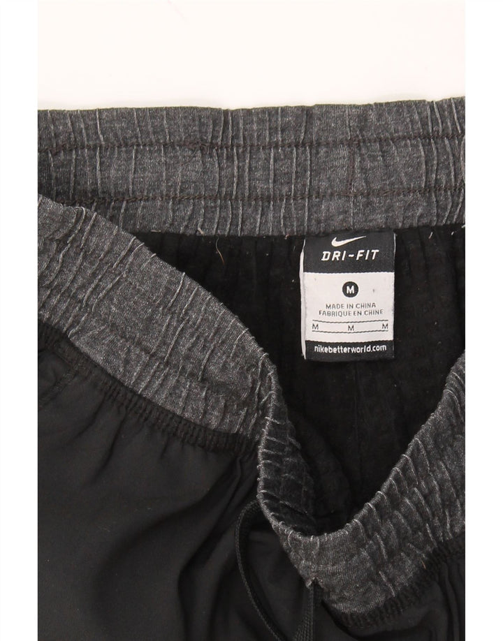 NIKE Mens Dri Fit Tracksuit Trousers Joggers Medium Black Polyester Vintage Nike and Second-Hand Nike from Messina Hembry 