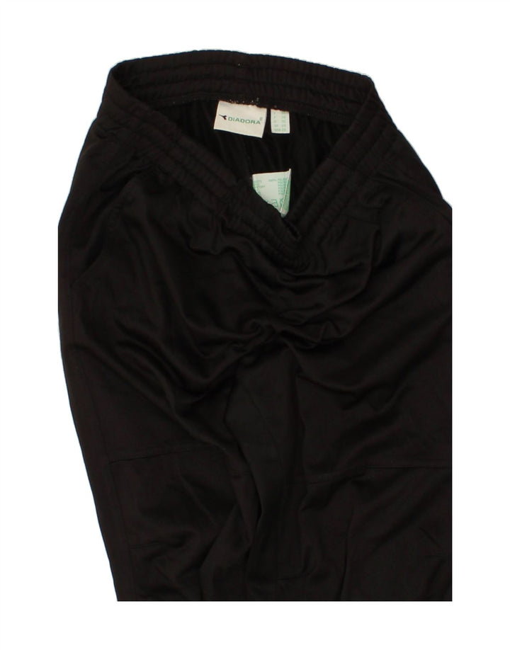 DIADORA Boys Tracksuit Trousers 9-10 Years Black Colourblock Polyester Vintage Diadora and Second-Hand Diadora from Messina Hembry 