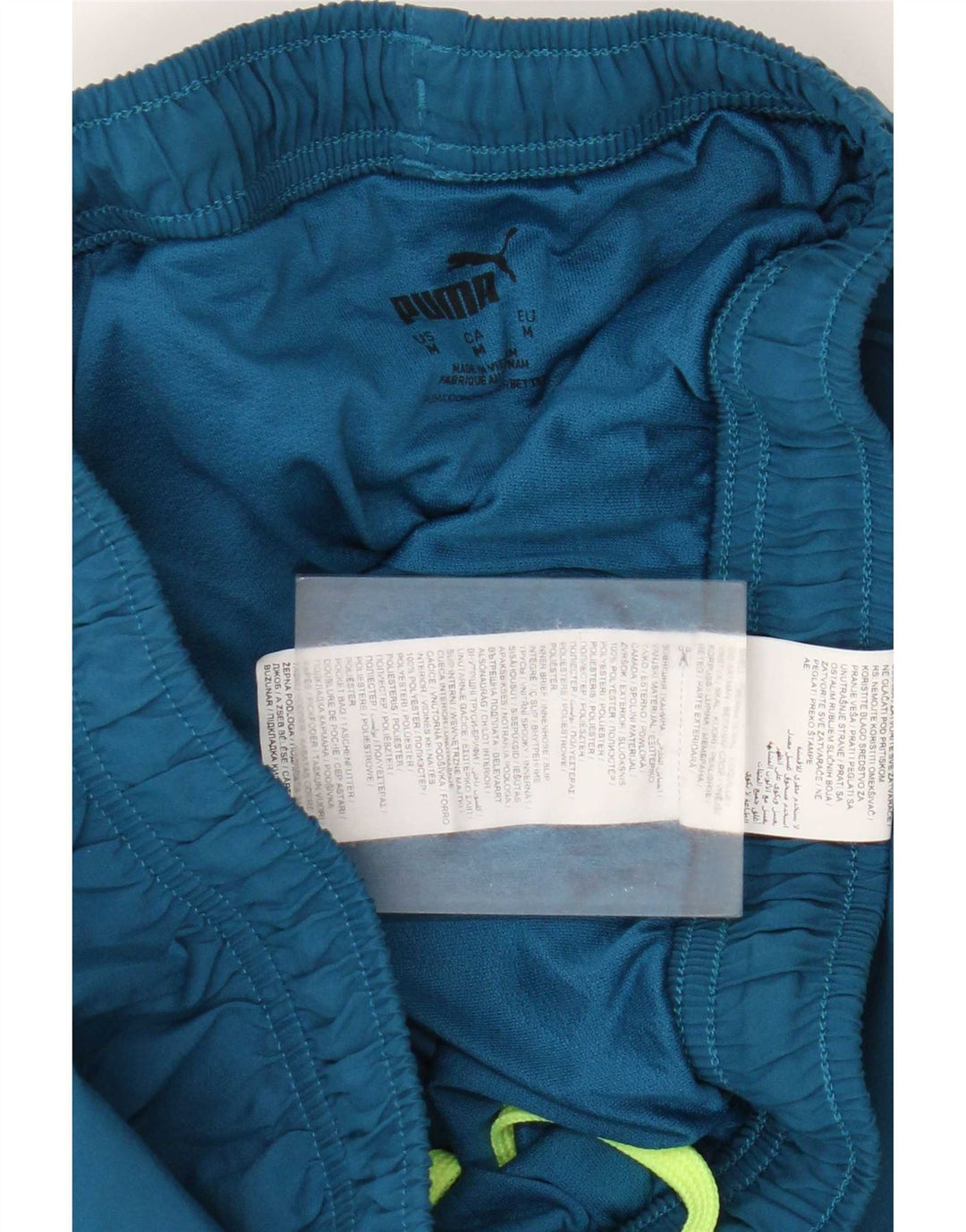 Puma Short de Sport Homme Bleu Moyen Colorblock Polyester