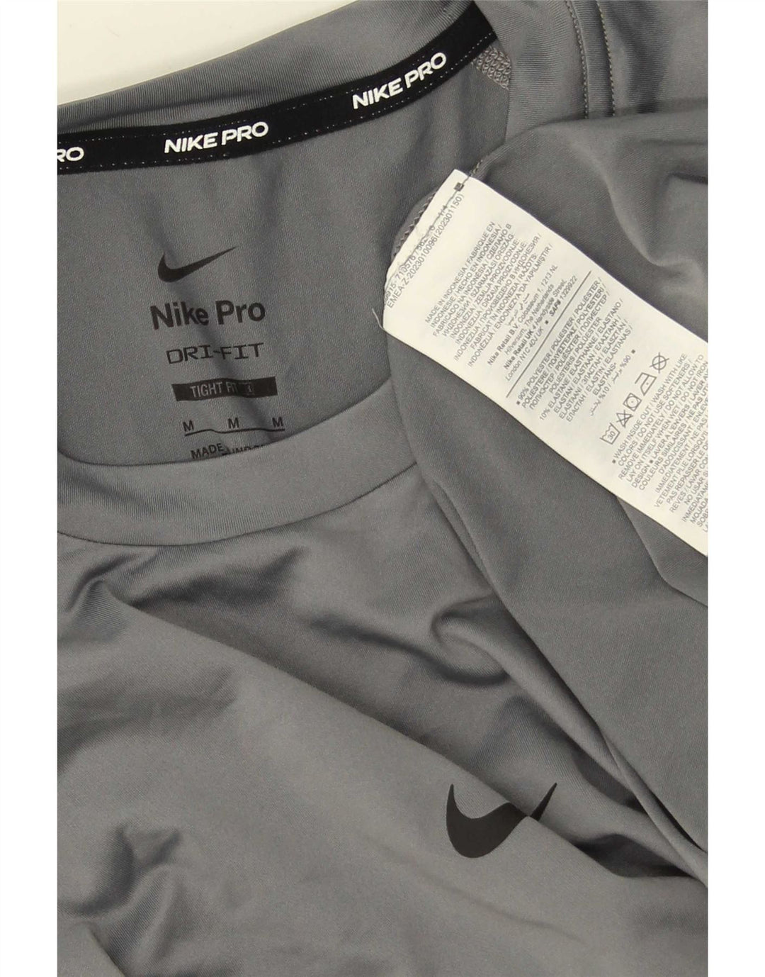 T-shirt Nike da uomo aderente, top in poliestere grigio medio