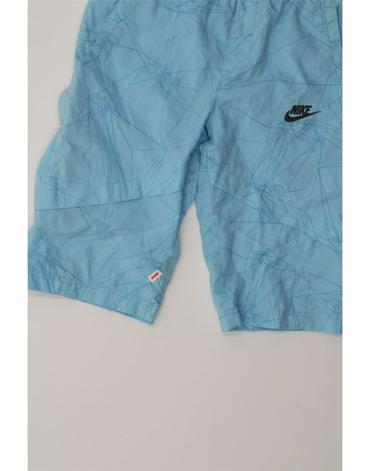 NIKE Boys Graphic Sport Shorts 8-9 Years Small Blue Geometric Polyester Vintage Nike and Second-Hand Nike from Messina Hembry 