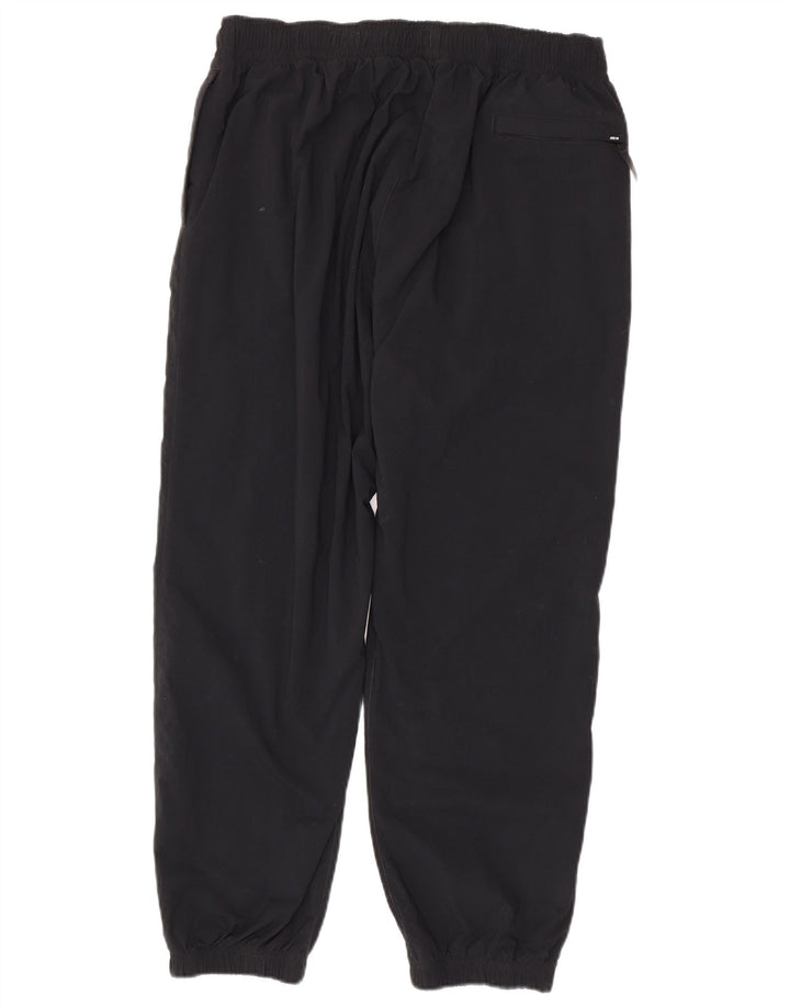 Męskie spodnie dresowe Nike, joggery, średni czarny nylon