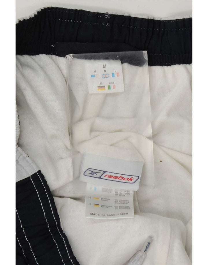Pantaloncini sportivi Bermuda da uomo Reebok, poliestere color block grigio medio