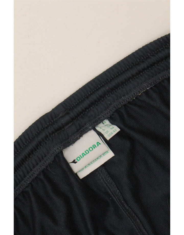 DIADORA Mens Tracksuit Trousers XS  Navy Blue Polyester Vintage Diadora and Second-Hand Diadora from Messina Hembry 