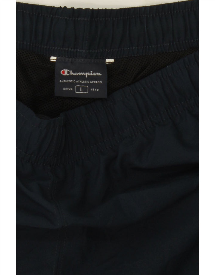CHAMPION Mens Tracksuit Trousers Large  Navy Blue Polyester Vintage Champion and Second-Hand Champion from Messina Hembry 
