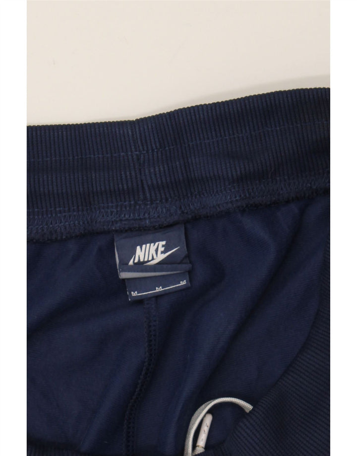 NIKE Mens Tracksuit Trousers Medium  Navy Blue Polyester Vintage Nike and Second-Hand Nike from Messina Hembry 
