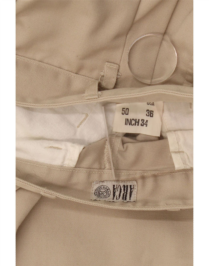VINTAGE Mens Pegged Chino Trousers W34 L27 Beige Polyester Vintage Vintage and Second-Hand Vintage from Messina Hembry 