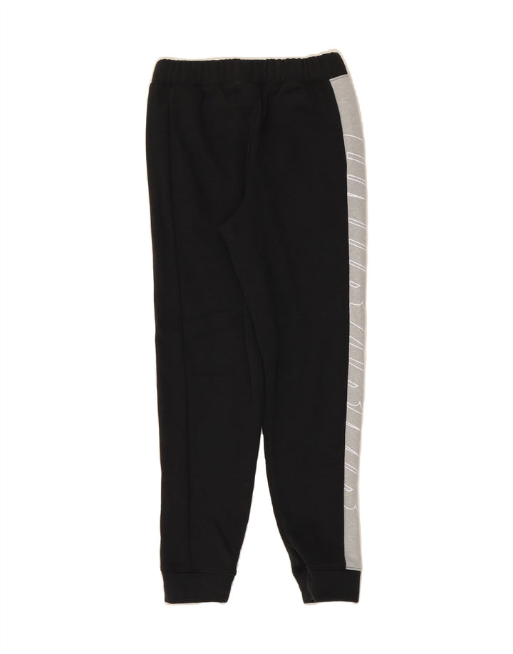 UNDER ARMOUR Boys Tracksuit Trousers Joggers 9-10 Years Medium  Black Vintage Under Armour and Second-Hand Under Armour from Messina Hembry 