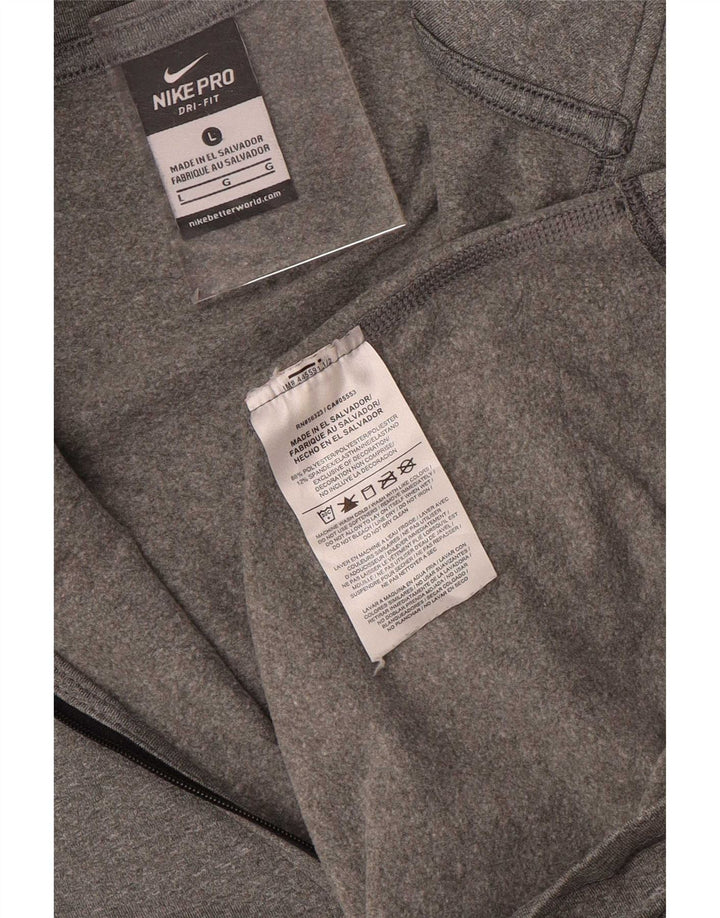 Nike Haut de survêtement Dri Fit à col zippé pour femme UK 14 Large Gris