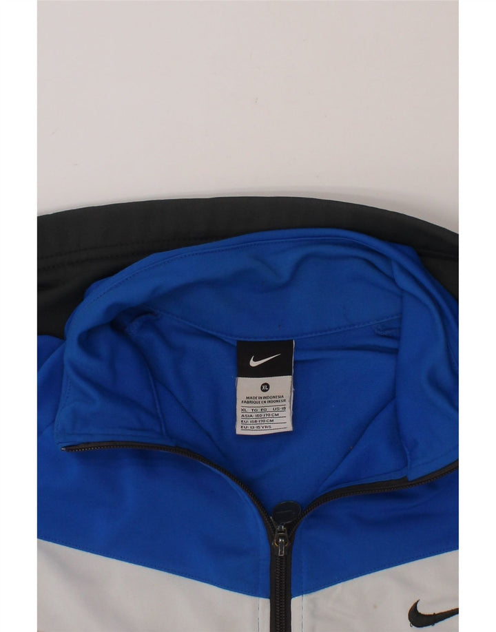 NIKE Boys Tracksuit Top Jacket 13-14 Years XL  Blue Colourblock Polyester Vintage Nike and Second-Hand Nike from Messina Hembry 