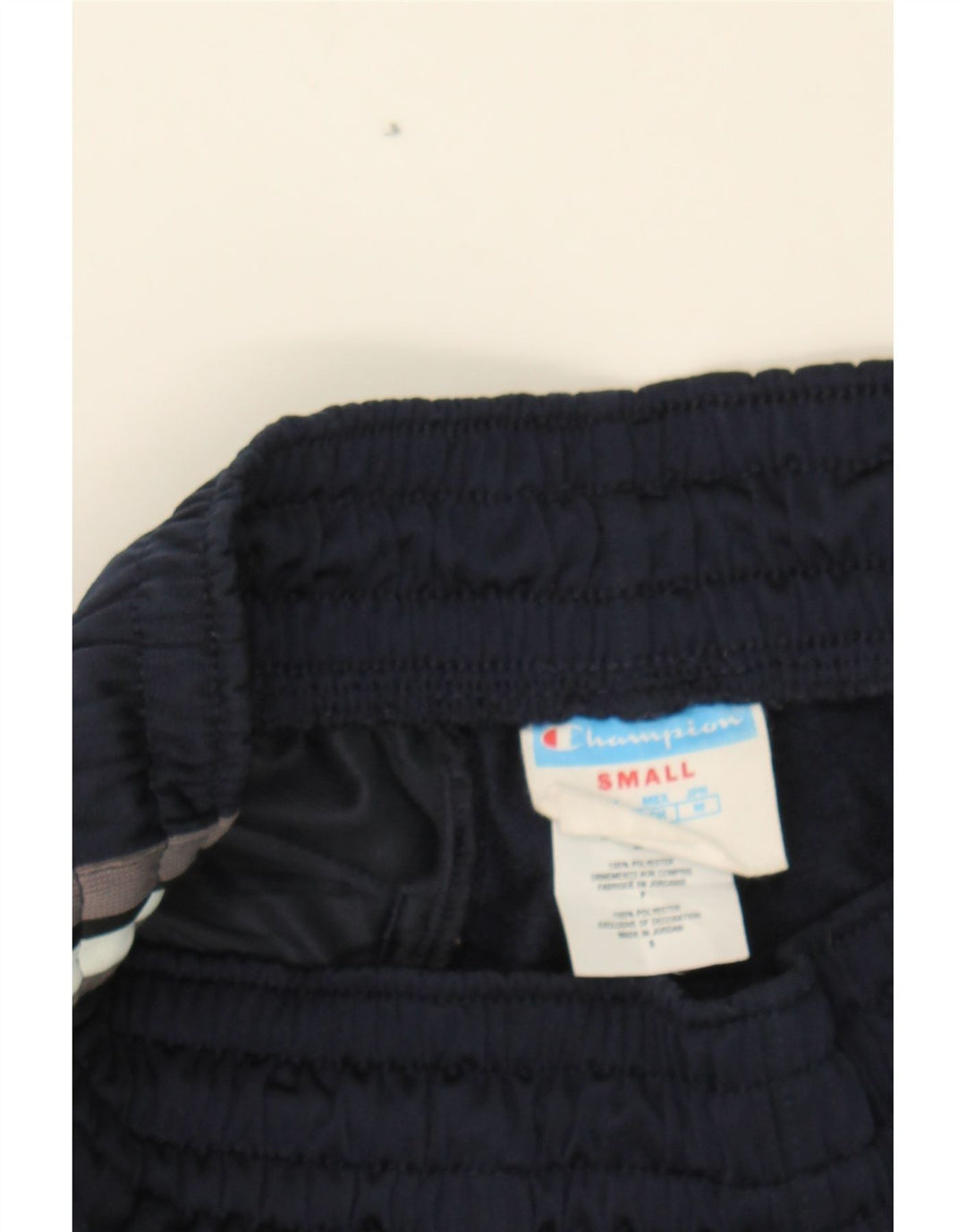 CHAMPION Mens Tracksuit Trousers UK 10 Small Navy Blue Polyester Vintage Champion and Second-Hand Champion from Messina Hembry 