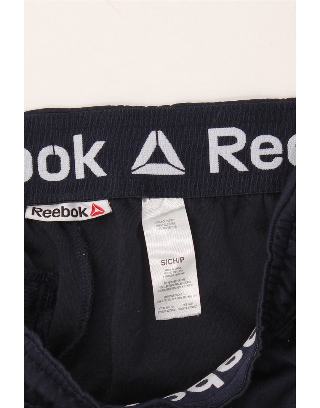 REEBOK Mens Tracksuit Trousers Small Navy Blue Colourblock Polyester Vintage Reebok and Second-Hand Reebok from Messina Hembry 