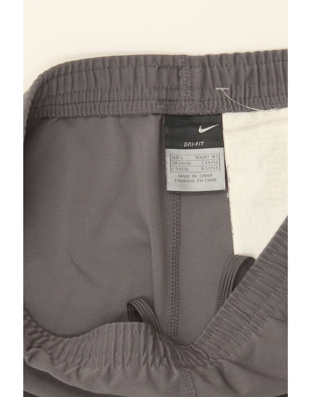 NIKE Womens Dri Fit Tracksuit Trousers UK 34/36 Large Grey Polyester Vintage Nike and Second-Hand Nike from Messina Hembry 