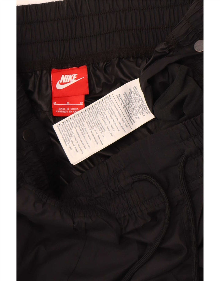 Pantaloni impermeabili Nike Joggers da donna UK 12 medio nero poliestere